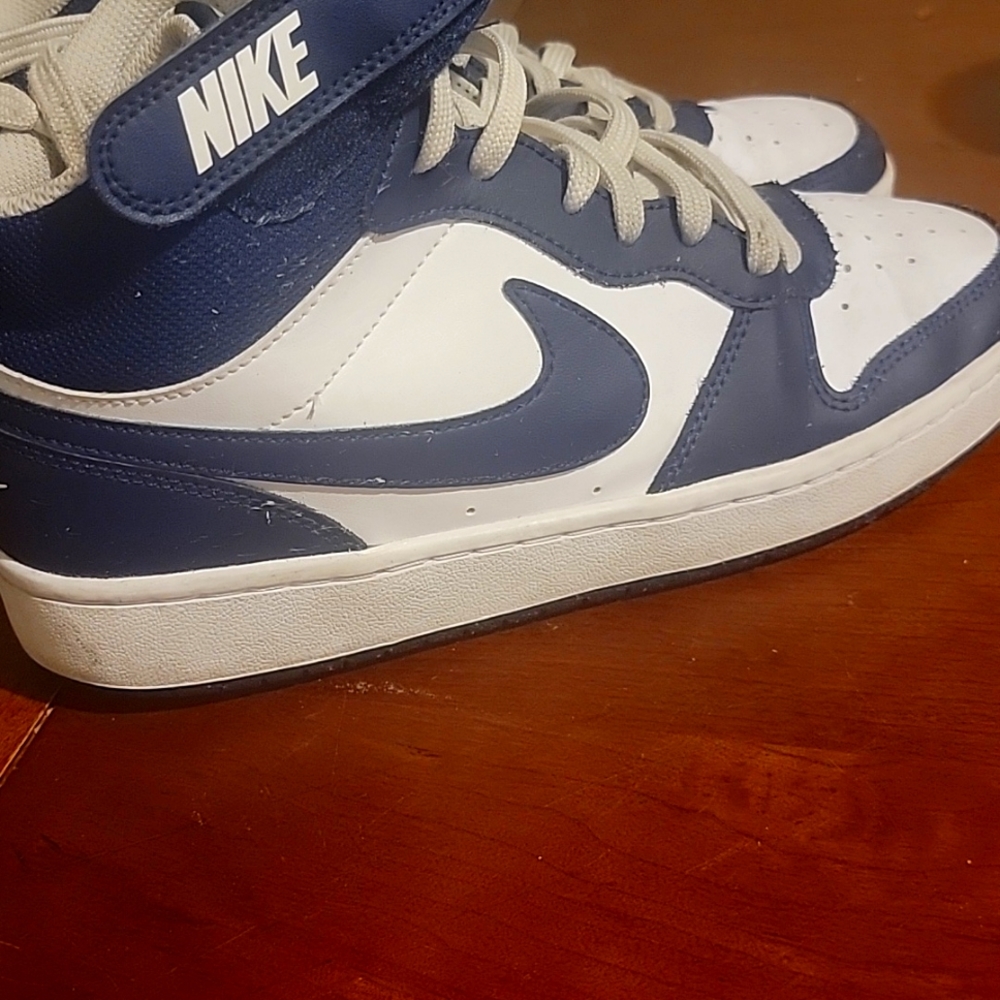 Blue and white Nikes 7Y